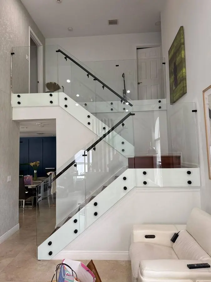 Glass stair railing with standoff system
