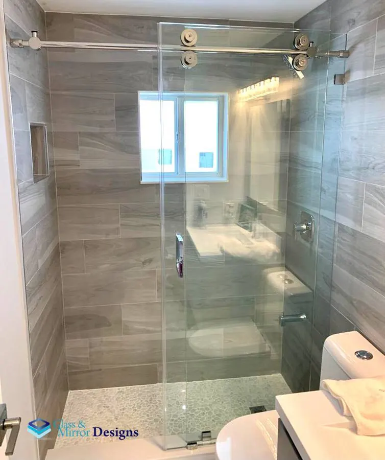 Frameless sliding shower door installation